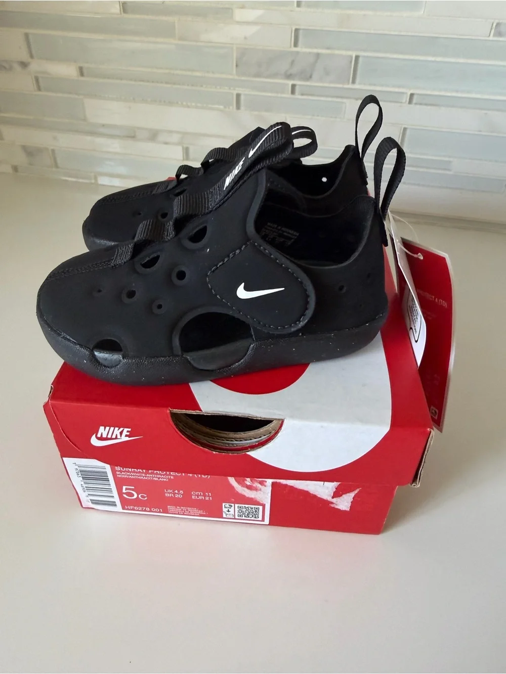 Nike Black Kids' Water Shoes with White Swoosh